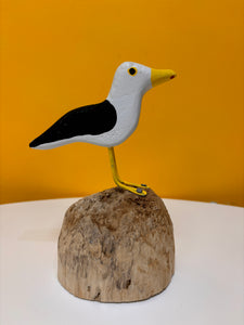 Seagull on a rounded piling