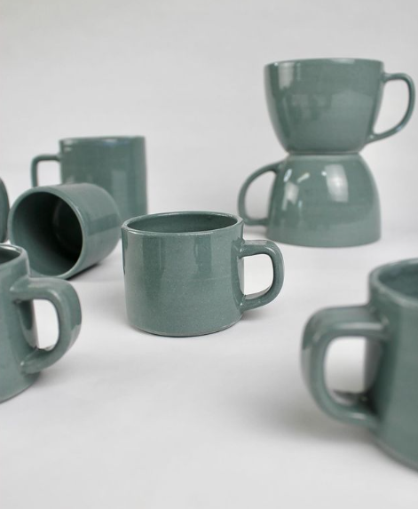 Scattered sage blue/grey espresso mugs with handles.