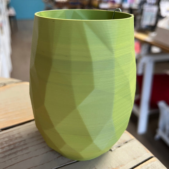 Bright green 3D printed wine glass, texture is visible
